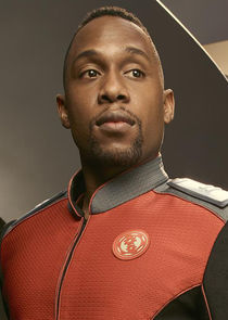 J. Lee
as Lt. Cmdr. John Lamarr