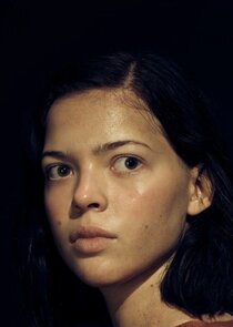 Logan Polish
as Dina Fox