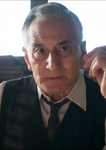 Henry Goodman
as Sidney Prynne