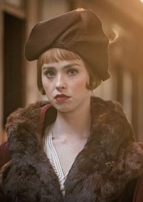 Freya Mavor
as Thora Grey