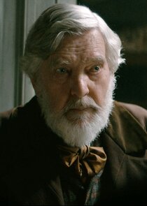 Tom Courtenay
as Cedric Baxter