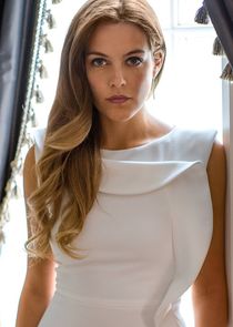 Riley Keough
as Christine Reade