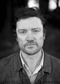 Steve Wall
as Baz Crowley