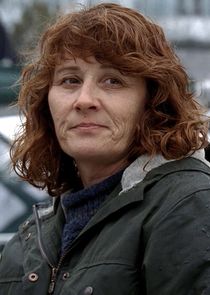 Annie Corley
as Regi Darnell