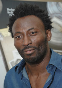 Babs Olusanmokun
as Ade