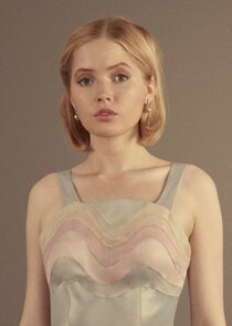 Ellie Bamber
as Angela Knippenberg