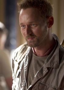 Rod Hallett
as Dr. Malcolm Wallace