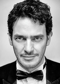 Kal Naga
as Informant