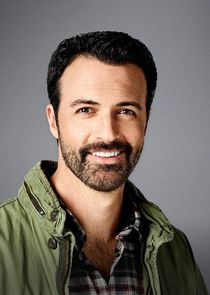 Reid Scott
as Eli Cohen