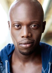 Keston John
as Merchant