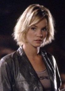 Ashley Scott
as Asha Barlowe