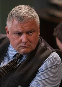 Conleth Hill
as Superintendent O'Kelly