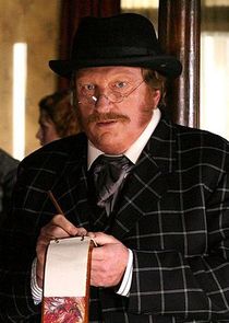 Jeffrey Jones
as A.W. Merrick