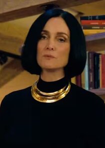 Carrie-Anne Moss
as Greta Nelso