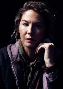 Jenna Elfman
as June