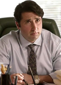 George Houvardas
as Chris George MP