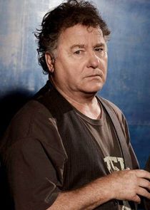 Peter Gerety
as Desmond Timoney