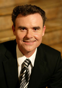 Darren Gilshenan
as Hugo Drivas