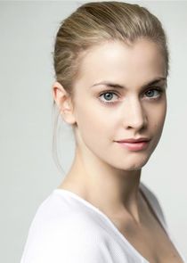 Stefanie Martini
as Madame Louise Maigret