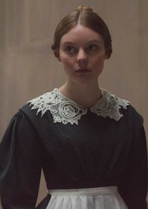 Nell Hudson
as Nancy Skerrett