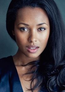 Melanie Liburd
as Caridad 