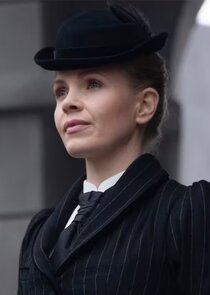 Kate Phillips
as Eliza Scarlet