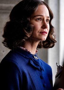 Katherine Waterston
as Ginny Aimes