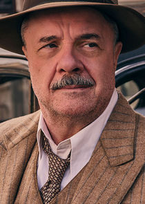 Nathan Lane
as Lewis Michener