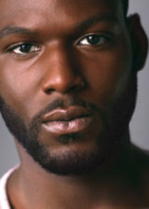 Kofi Siriboe
as Ralph Angel Bordelon