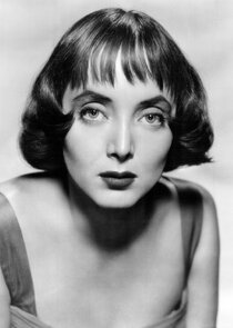 Carolyn Jones
as Mrs. Moore