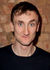 Tom Brooke
as Angus Woolf