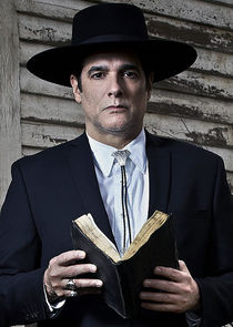 Yul Vazquez
as Rev. Emilio Sheehan