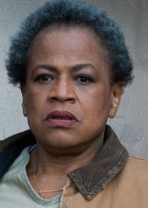 Michelle Hurst
as Miss Claudette Pelage