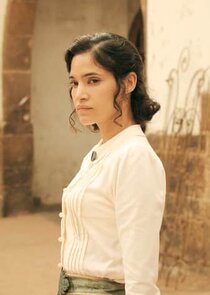 Sofia Boutella
as Eve Mansour