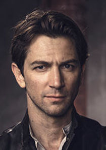 Michiel Huisman
as Walter Davidson
