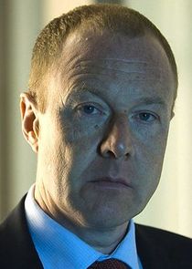 Hugh Simon
as Malcolm Wynn-Jones