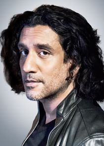 Naveen Andrews
as Ruben Julian Cousins
