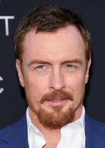 Toby Stephens
as Damian Cray