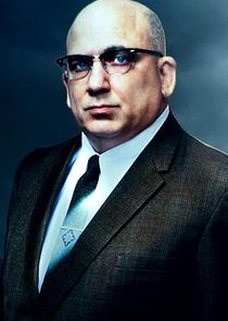 Jonathan Coyne
as Warden Edwin James