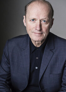 Adrian Edmondson
as Sir Roger Hollis