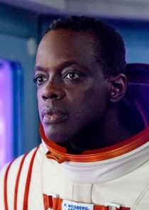 Ato Essandoh
as Kwesi Weisberg-Abban