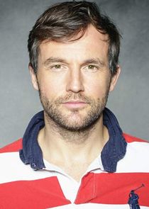 Shaun Benson
as Johnny Riley