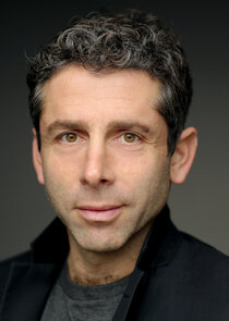 Elliot Levey
as Inspector Bliss