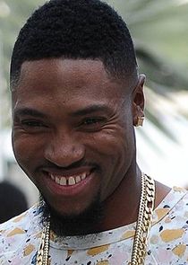 London Brown
as Reggie Morris