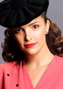 Jodi Balfour
as Gladys Witham