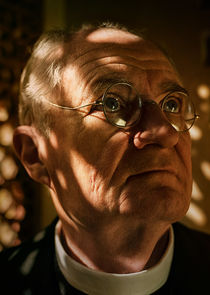 Jim Broadbent
as Father Roberts