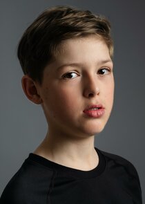 Oliver Savell
as Young Alan Carr