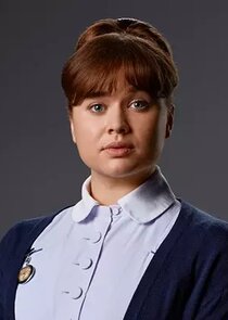 Megan Cusack
as Nancy Corrigan