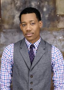 Tyler James Williams
as Russ 