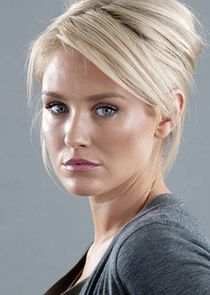 Nicky Whelan
as Laura Mitchell